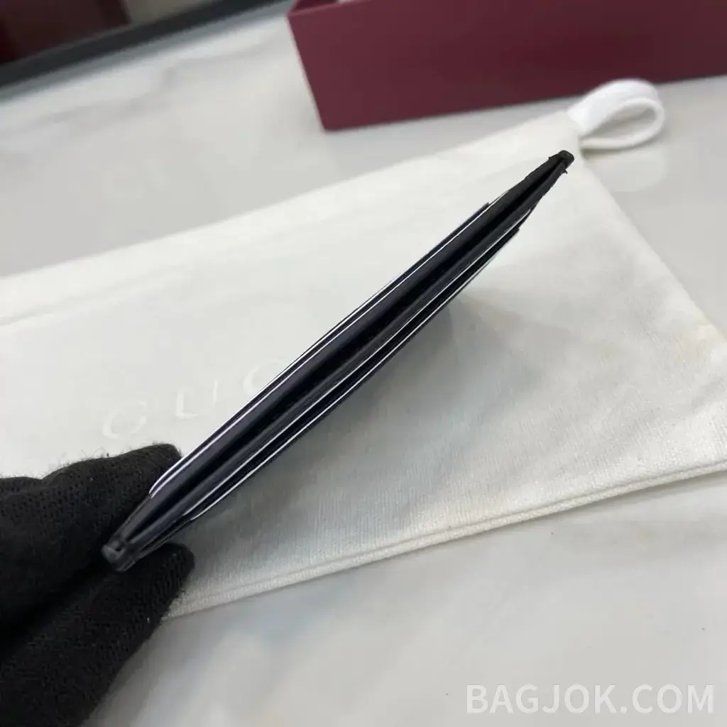 구찌 구찌 블랙 GG 레더 임프린트 카드 홀더 상세 이미지