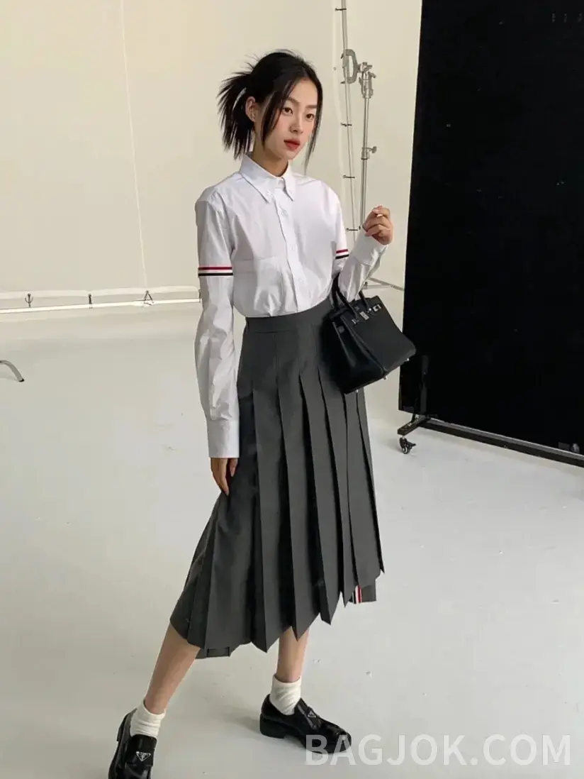 톰브라운 톰브라운 드롭 백 플리츠 미디 스커트 상세 이미지