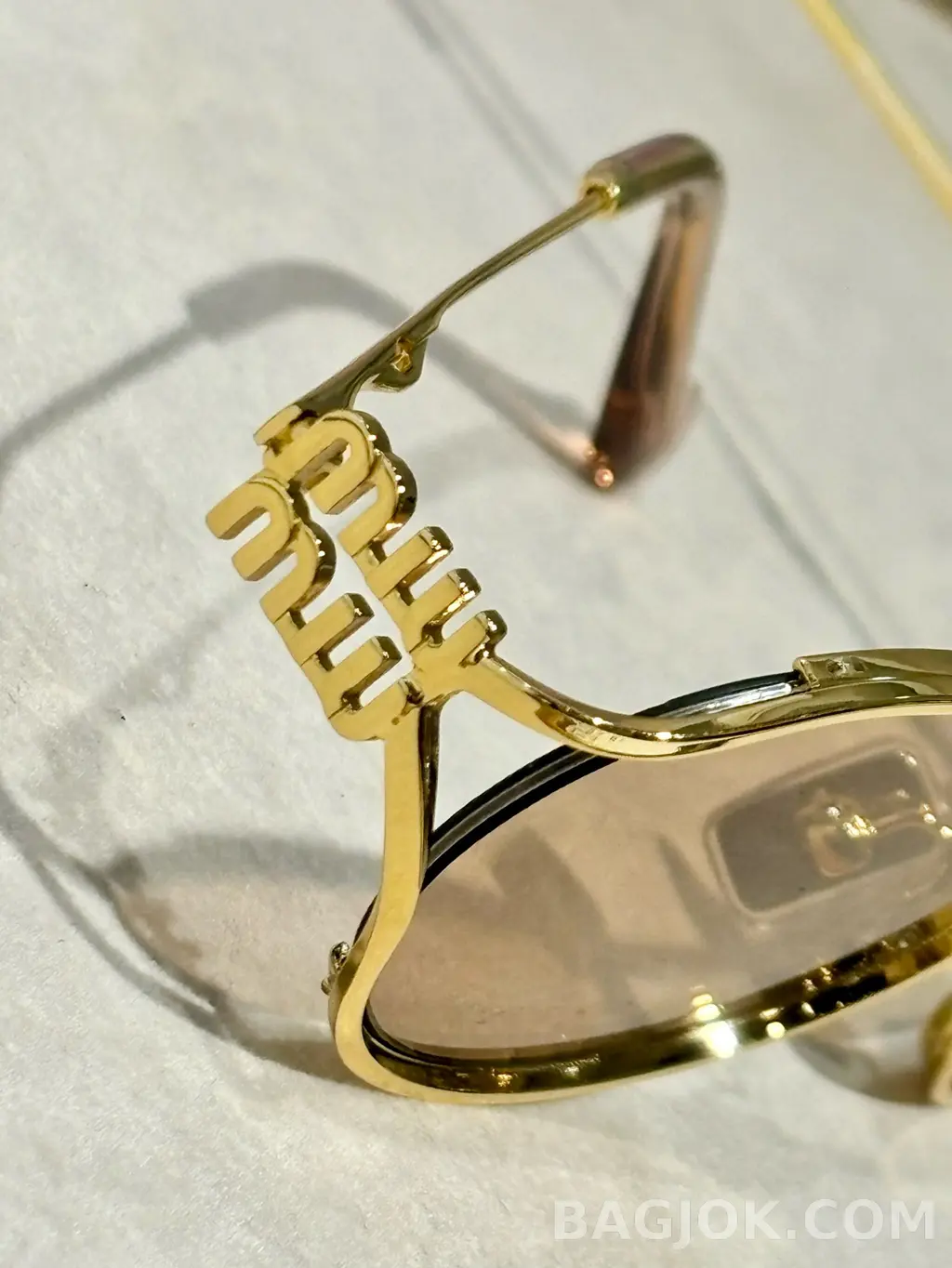 미우미우 MIU MIU SMU52Y 오벌 메탈 Sunglasses 상세 이미지