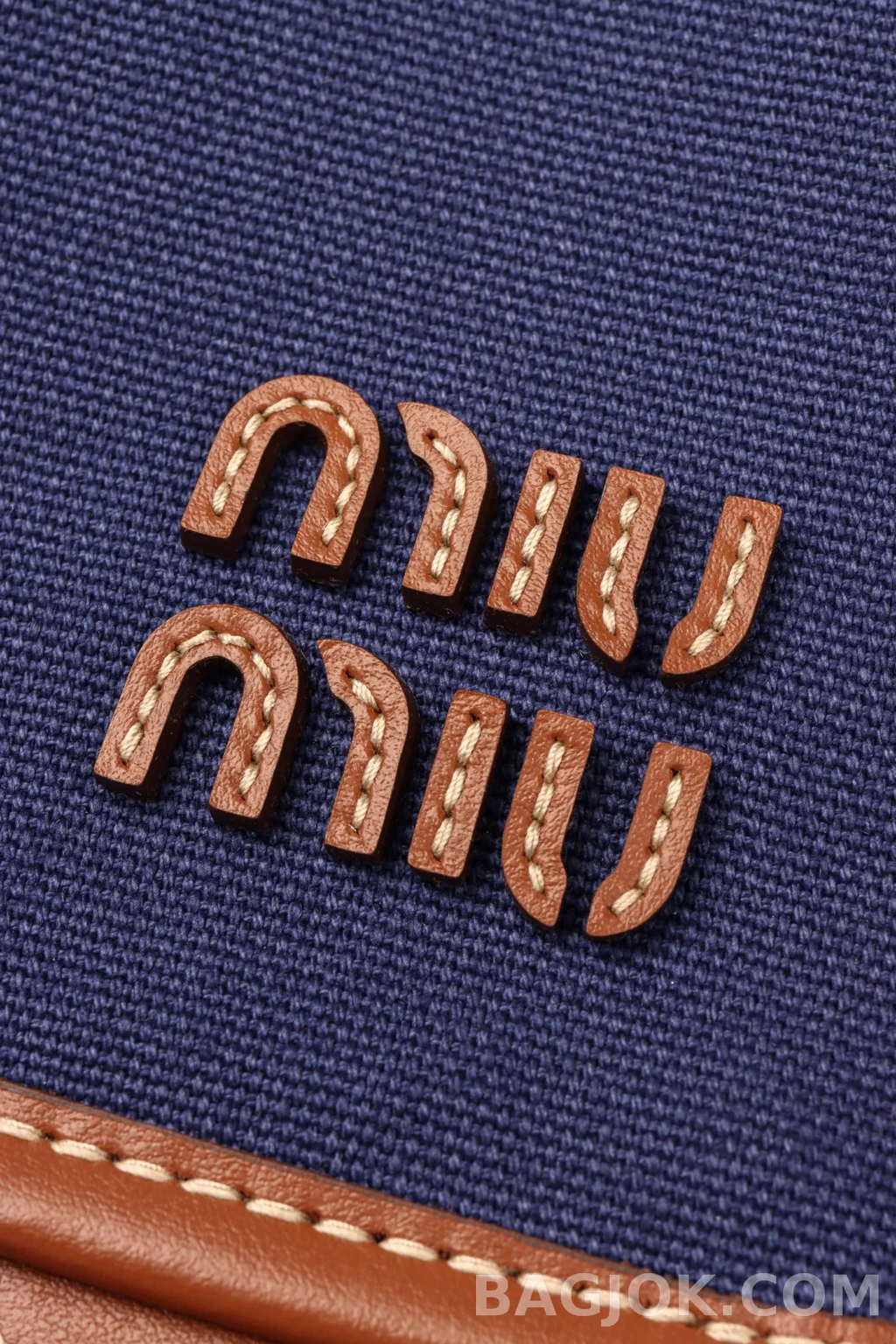 미우미우 MiuMiu 캔버스 앤 레더 백팩 미디움 상세 이미지