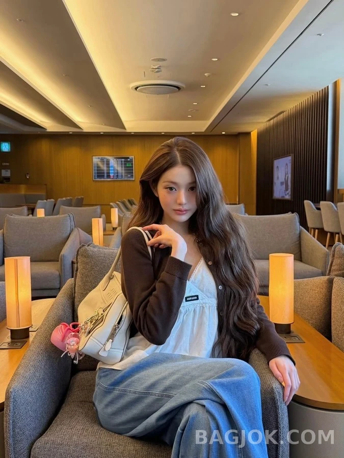 미우미우 미우미우 레트로 펀칭 라운드넥 가디건 상세 이미지